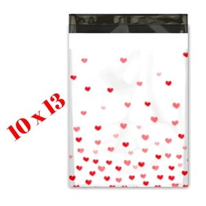 Poly Mailers 10x13 Fading hearts Valentine Is pink and white.
